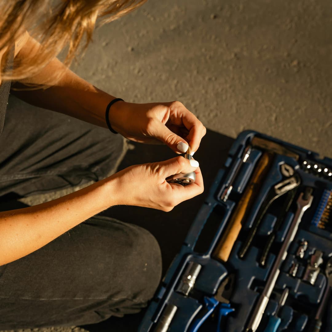 Gloved hand cleaning a surface